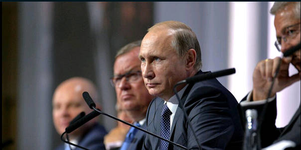 普京当众讽刺奥巴马:脑子里一团浆糊(图)