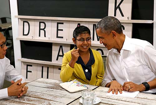 奥巴马拥抱难民少女:美国永远敞开大门(组图)