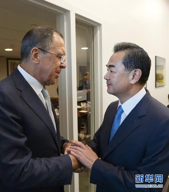 王毅:朝鲜用导弹技术发射卫星恐要付出代价(图)