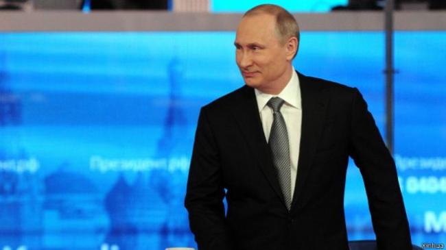 俄罗斯总统普京参加热线节目，谈再婚(图)