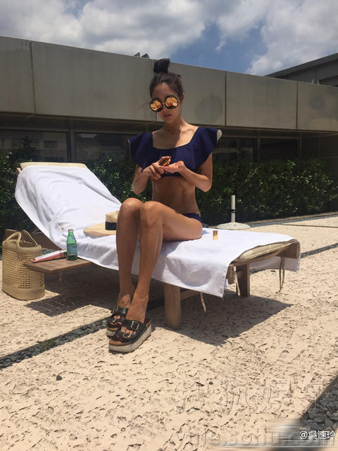 曹格有美娇妻!吴速玲长腿+古铜肌一个不少(组图)