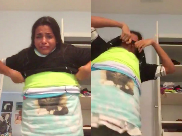 美国女子挑战穿百件衣服却无法脱掉 险些窒息(图)