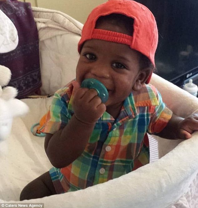 顽强求生!小男孩为10%生存几率截去四肢(组图)