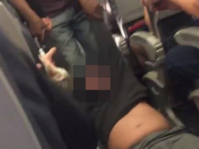 美联航强制乘客下机 谁的责任?(图/视频)